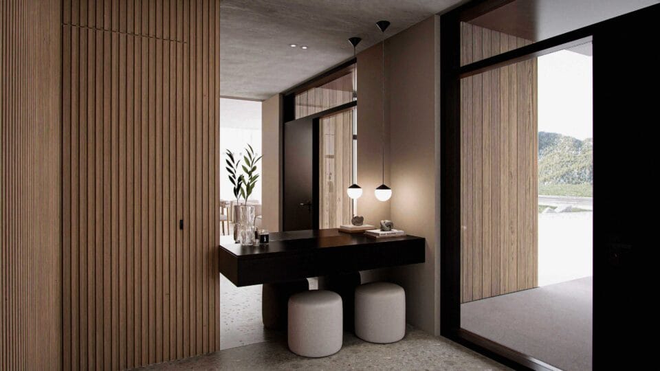 Solaris interior entry with black steel front door featuring tempered safety glass, seamless wood interior garage access, large mirror, and preparation table