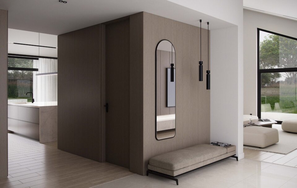 Aurora entry with wood-paneled wall, bench and mirror, open kitchen on the left and living room with floor-to-ceiling windows on the right, powder room centered