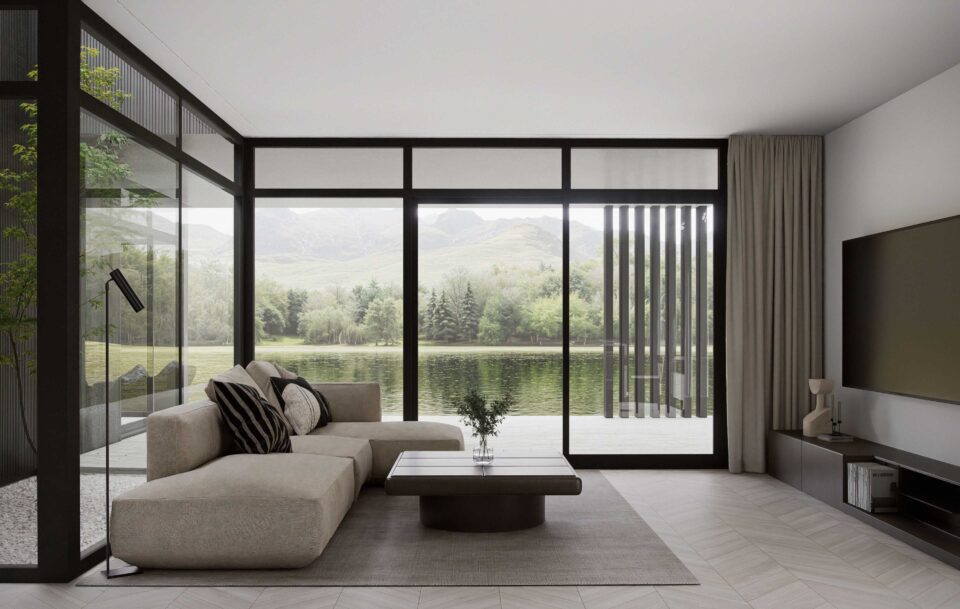 Lumina living room with floor-to-ceiling windows overlooking a lake, opening to a covered terrace and a small courtyard